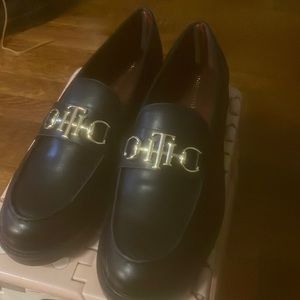 Black Tommy flat shoes,